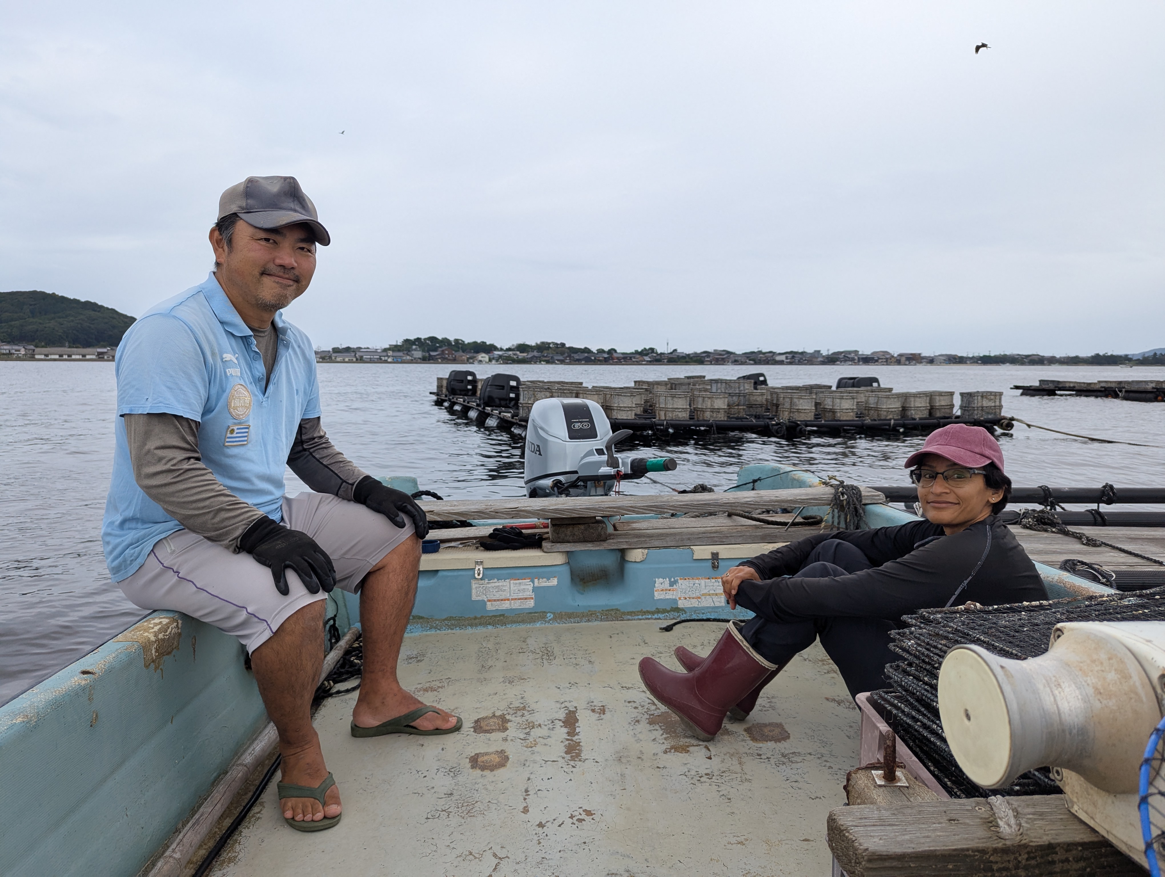 Atsushi on the oyster farm